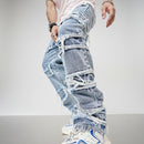 Ripped light blue jeans with white lace-up details worn by a person on a plain background