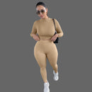 Woman in a beige outfit