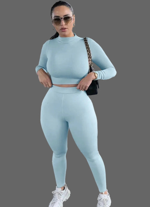 Woman in a light blue athletic outfit 