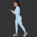 Woman in a light blue tracksuit 