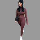 Woman in a brown outfit 