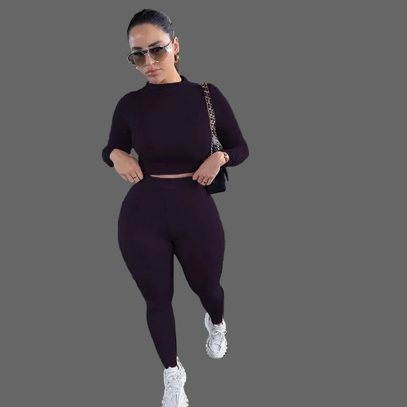 Woman in a dark outfit 