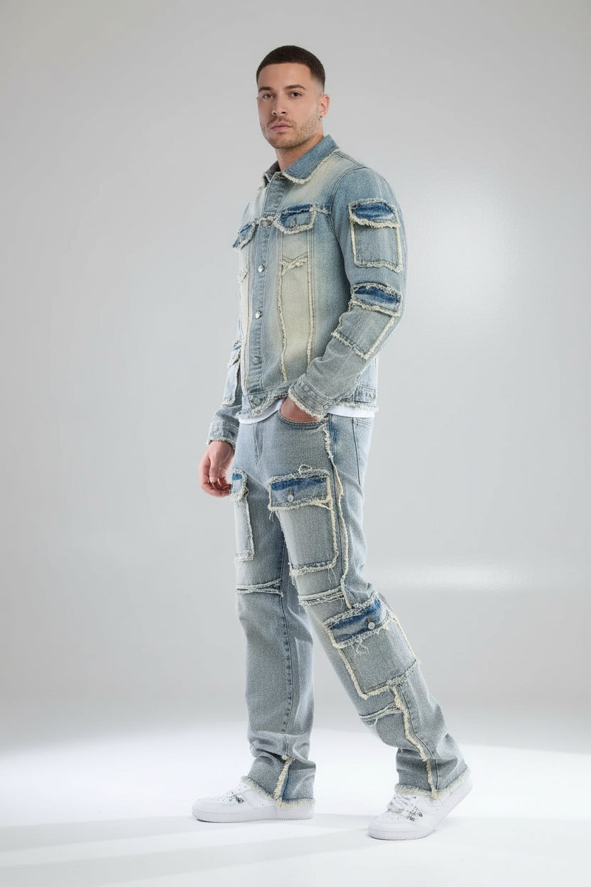 Person wearing a patchwork denim outfit on a gray background