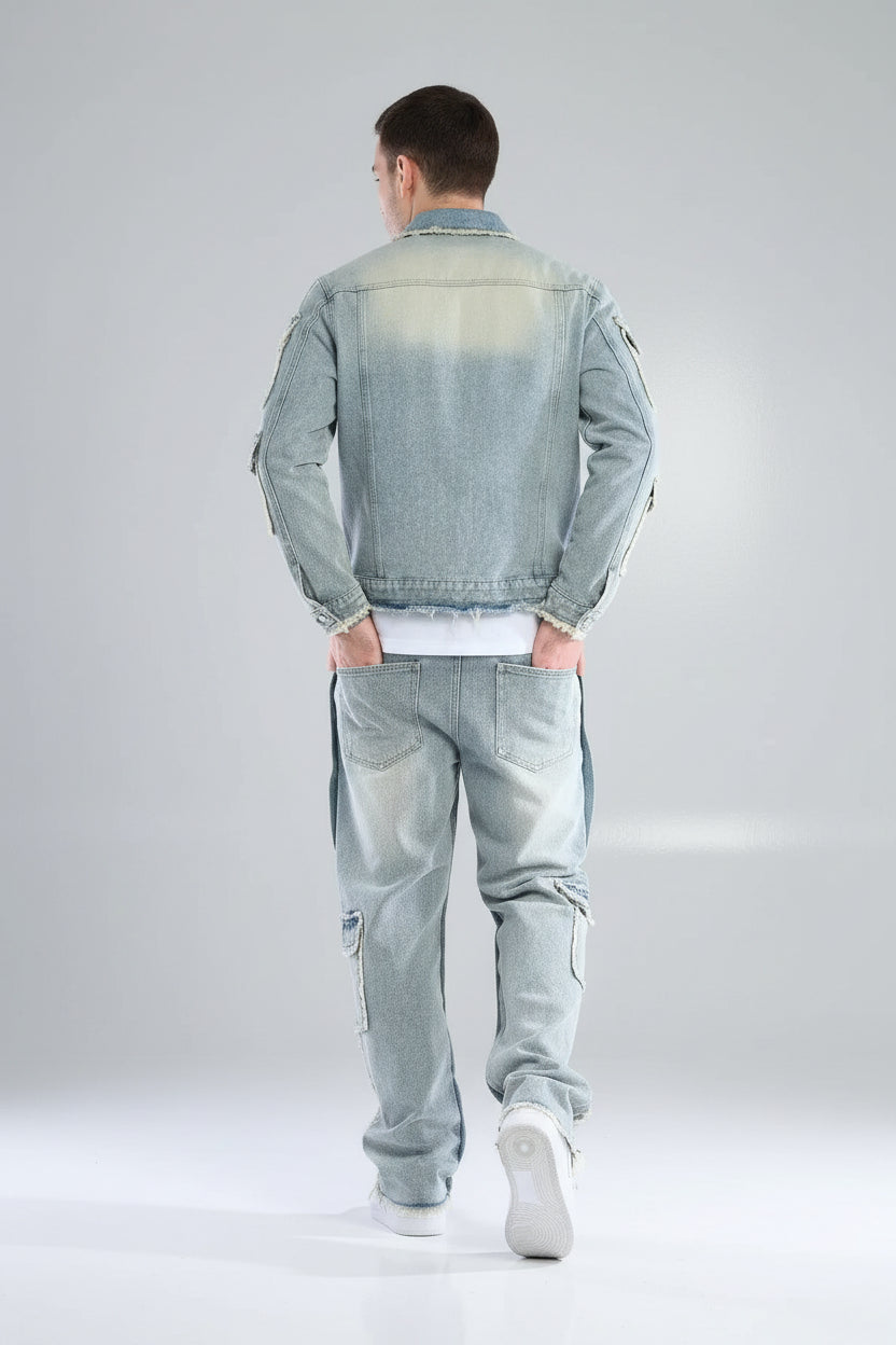 Person wearing a light blue denim jacket and pants on a white background
