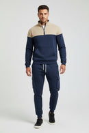 Navy and beige tracksuit with cargo pants on a white background