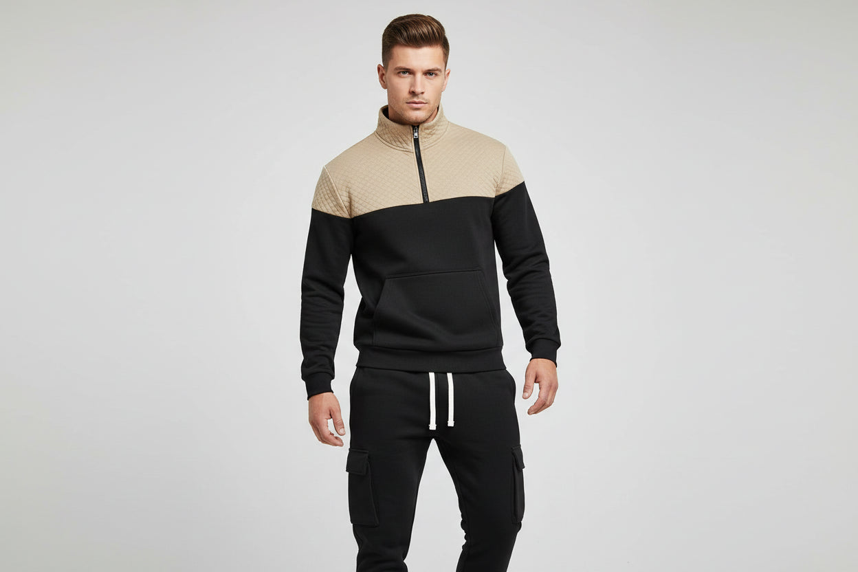 Two-tone hoodie and black cargo pants on a white background