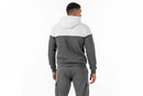 Gray and white color-blocked hoodie and pants set on a white background