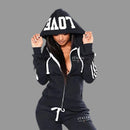 Person wearing a black hoodie with 'ITALIA' branding on a white background