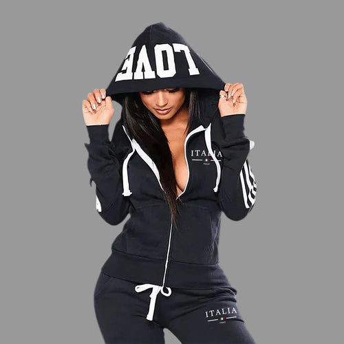 Person wearing a black hoodie with 'ITALIA' branding on a white background