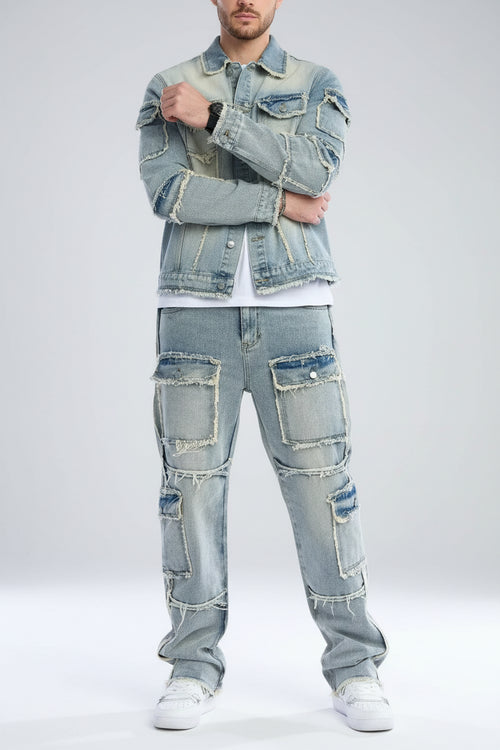 Person wearing a light blue denim jacket and pants on a gray background