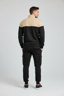 Black and beige tracksuit on a white background