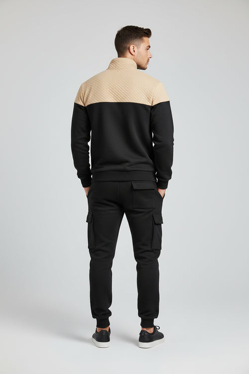 Black and beige tracksuit on a white background